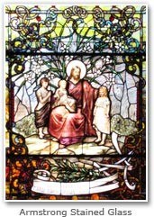 Stained glass window of Jesus and the children, a gift of the Armstrong family
